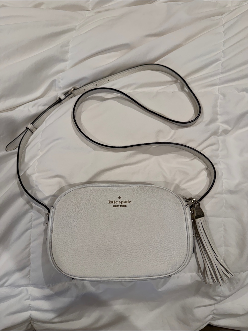 kate spade White Pebbled Leather Tassel Crossbody